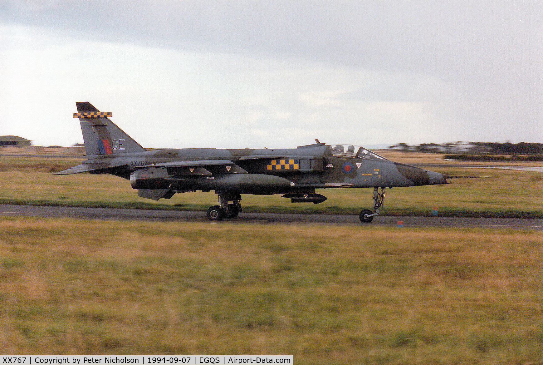 XX767, 1975 Sepecat Jaguar GR.1A C/N S.64, Jaguar GR.1A, callsign Wildcat 2, of 54 Squadron at RAF Coltishall taxying to Runway 05 at RAF Lossiemouth in September 1994.