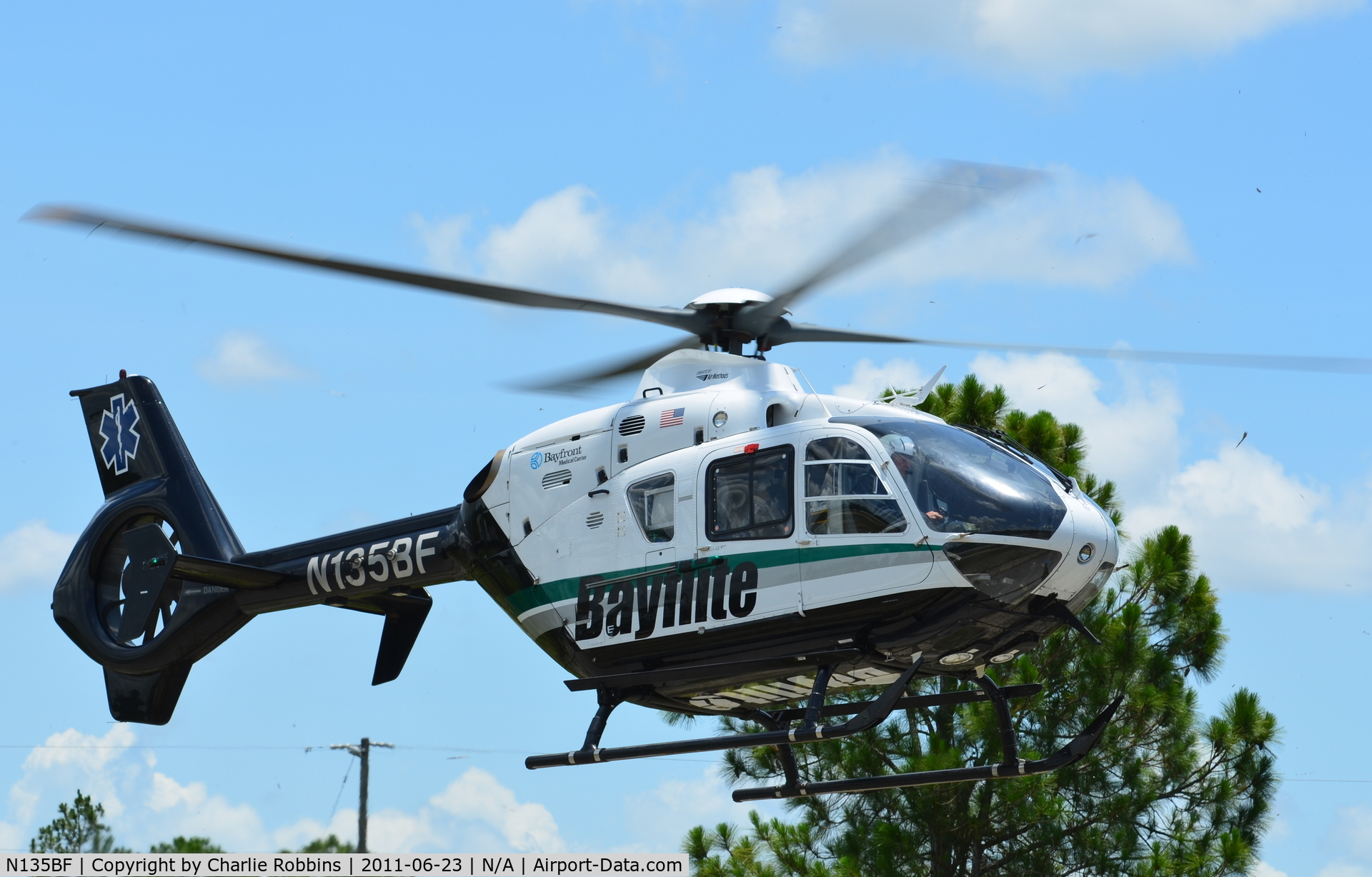 N135BF, 2006 Eurocopter EC-135P-2 C/N 0490, Bayflite 2 takes off from the l/z at East 14th Street & Joel Boulevard in Lehigh Acres, FL w/ a patient en route to Health Park Hospital.