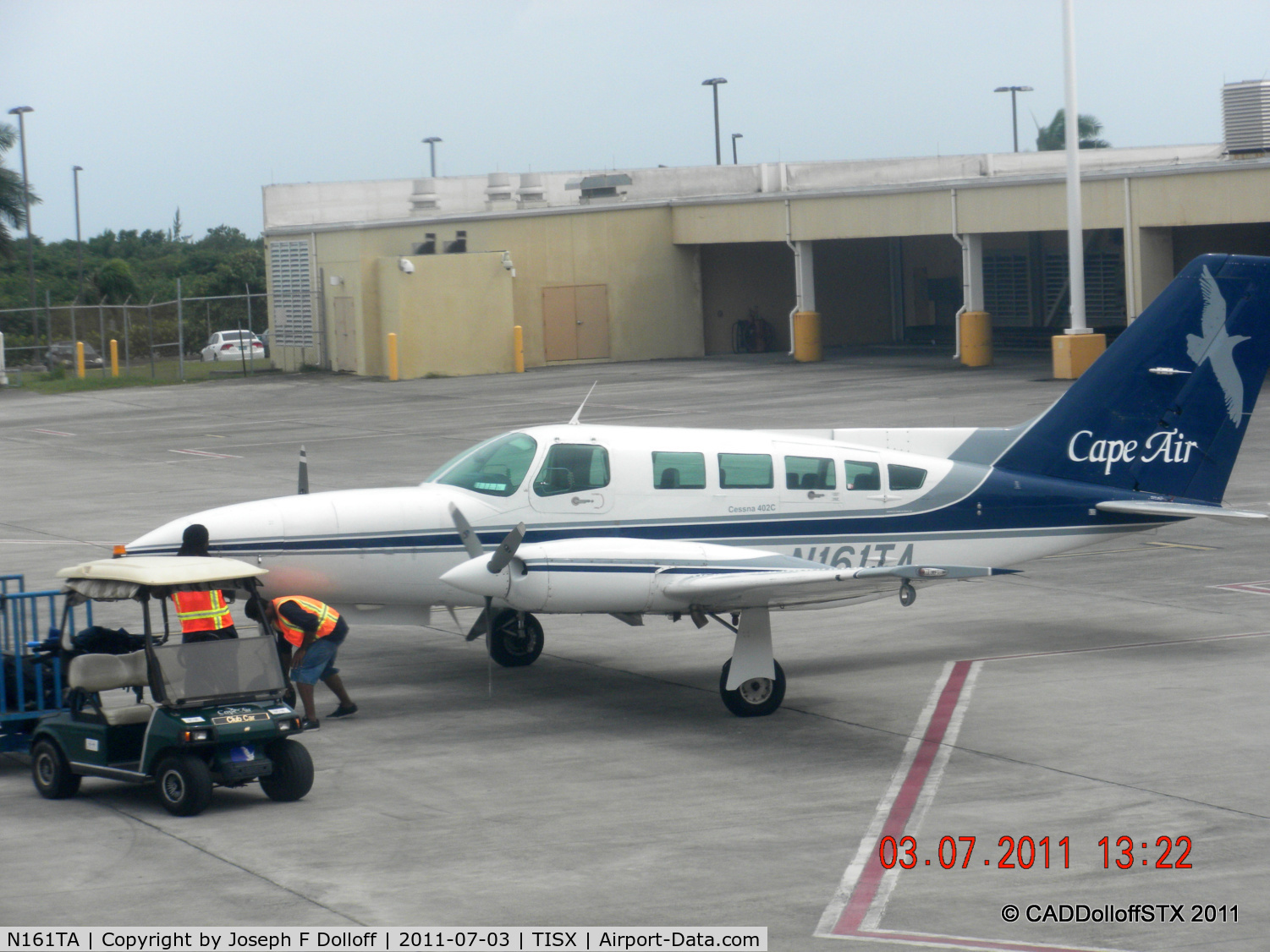 N161TA, 1979 Cessna 402C C/N 402C0070, Getting ready to load luggage at Henry E Rohlsen Airport.