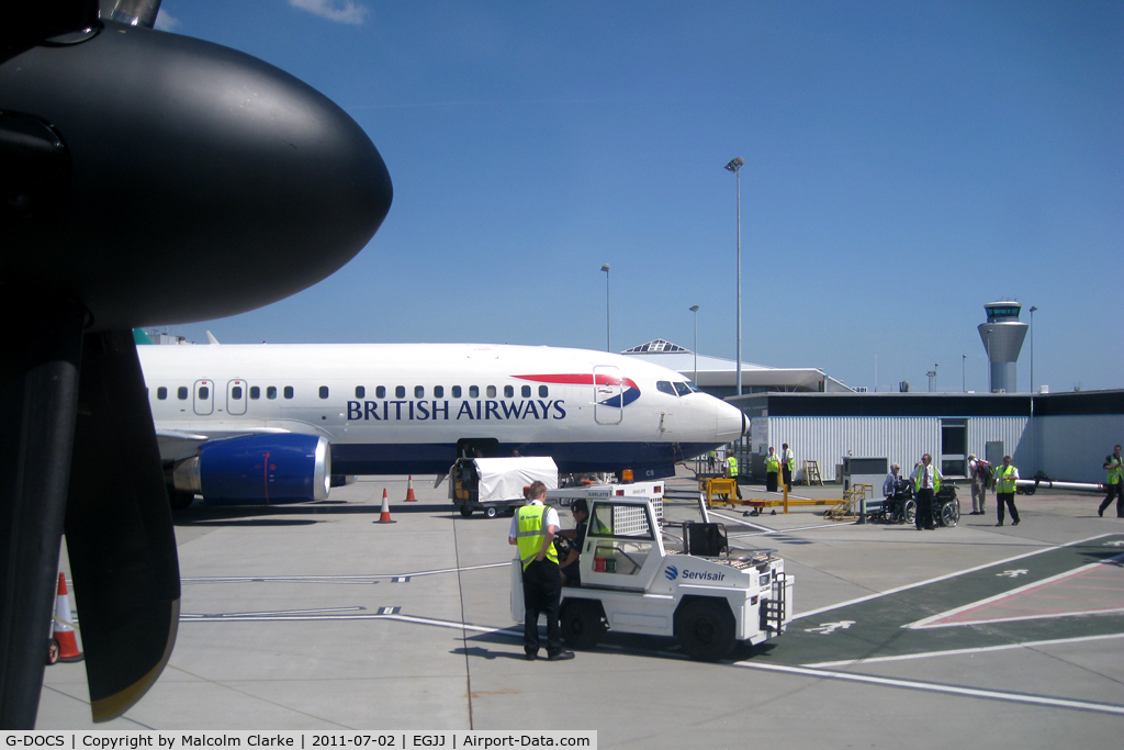 G-DOCS, 1992 Boeing 737-436 C/N 25852, Boeing 737-436 preparing for departure (taken from Dash 8 G-JEDJ), Jersey Airport, CI in July 2011.