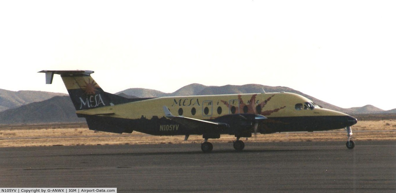 N105YV, 1994 Beech 1900D C/N UE-105, Mesa Airlines. At Kingman AZ 2002.