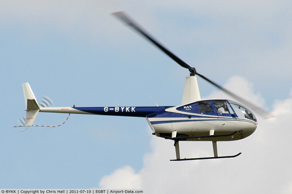 G-BYKK, 1999 Robinson R44 Astro C/N 0572, being used for ferrying race fans to the British F1 Grand Prix at Silverstone