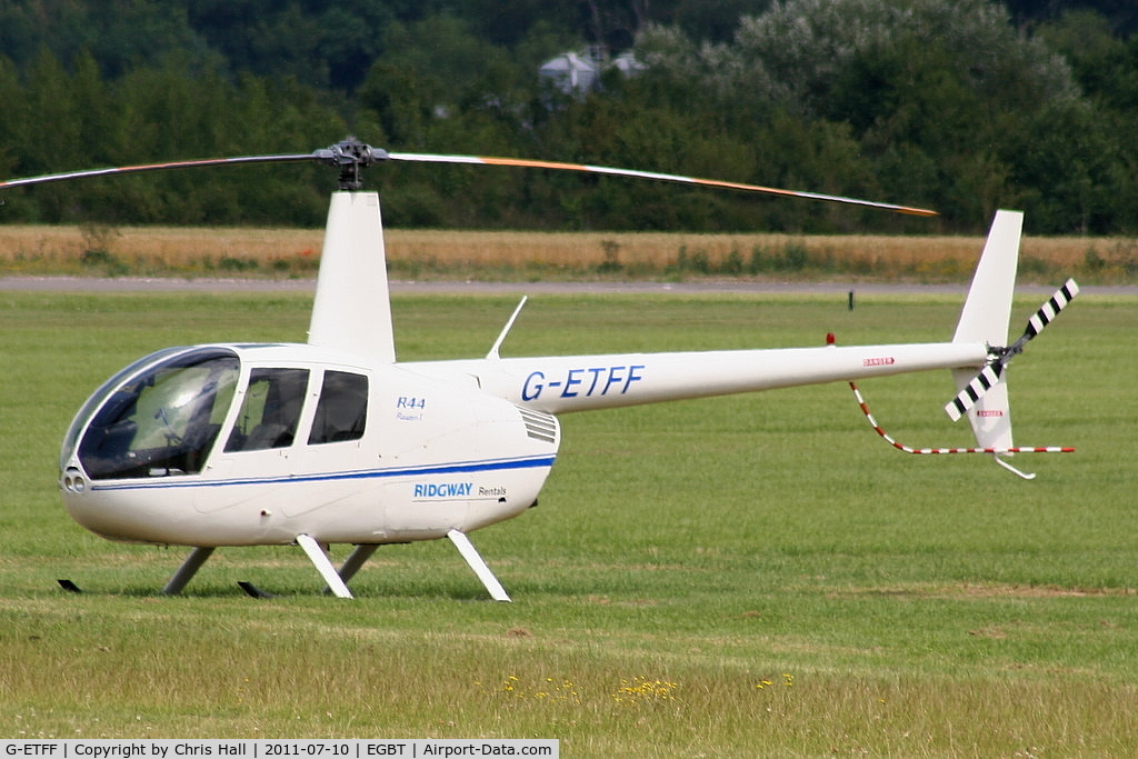 G-ETFF, 2007 Robinson R44 Raven C/N 1747, being used for ferrying race fans to the British F1 Grand Prix at Silverstone