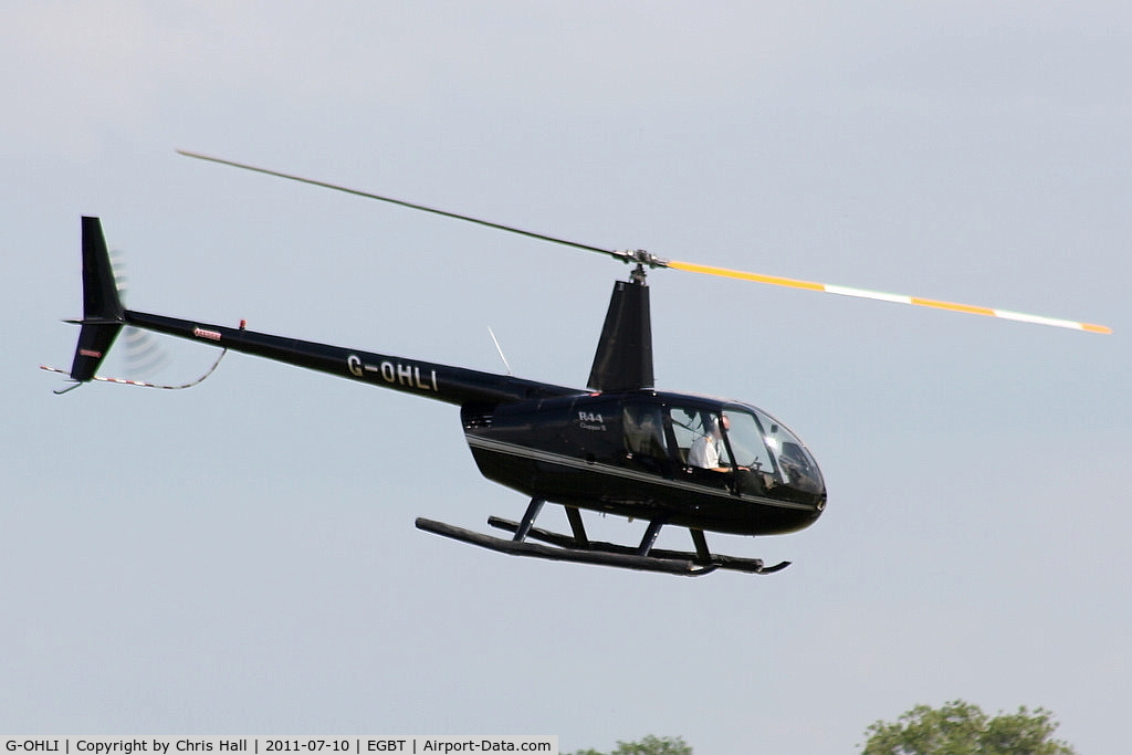 G-OHLI, 2005 Robinson R44 Clipper II C/N 10832, being used for ferrying race fans to the British F1 Grand Prix at Silverstone