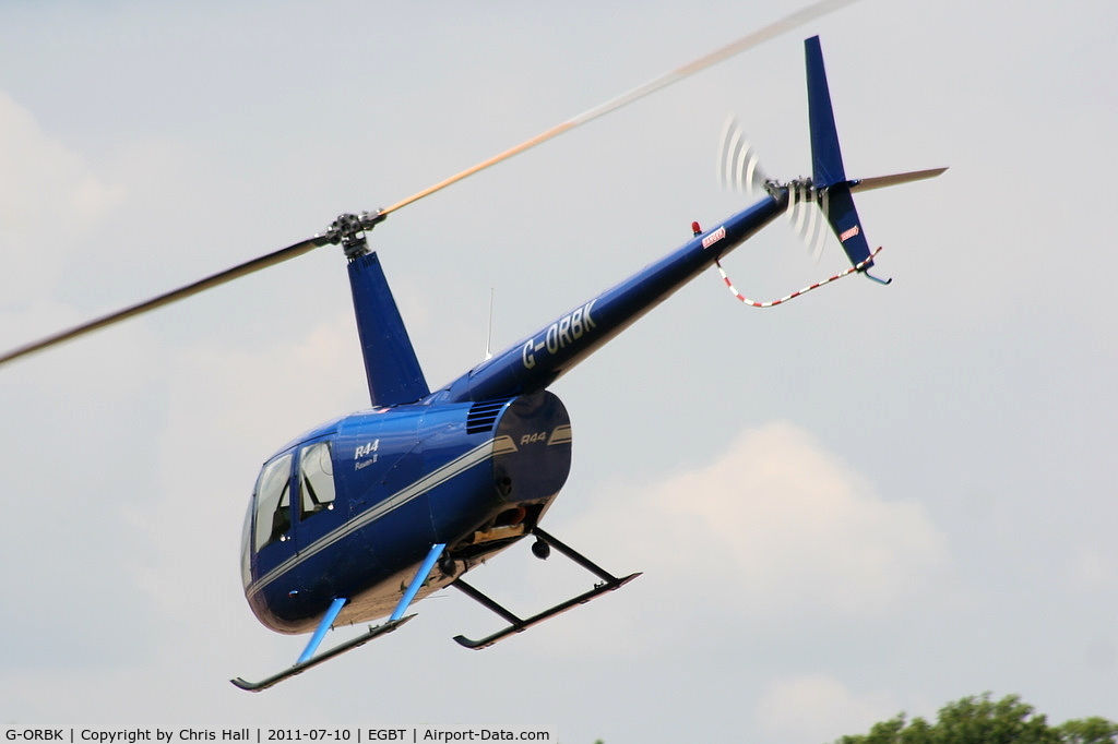 G-ORBK, 2003 Robinson R44 Raven II C/N 10213, being used for ferrying race fans to the British F1 Grand Prix at Silverstone