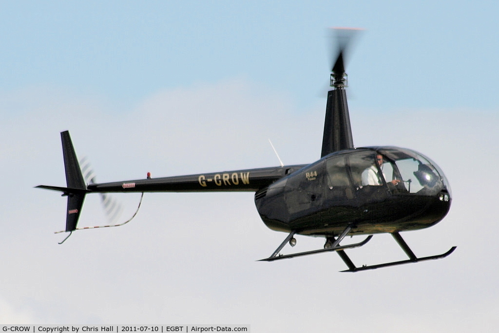G-CROW, 2000 Robinson R44 Astro C/N 0754, being used for ferrying race fans to the British F1 Grand Prix at Silverstone