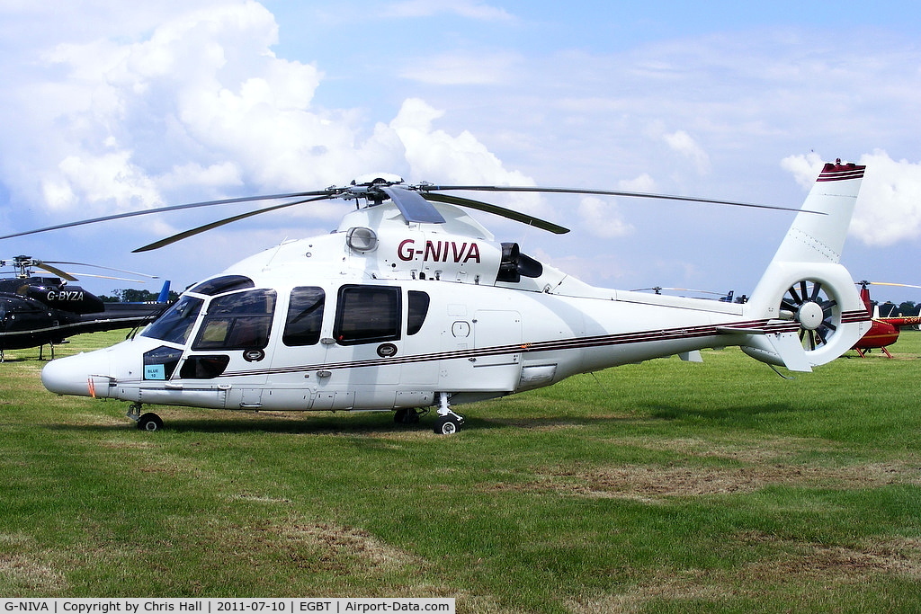 G-NIVA, 2003 Eurocopter EC-155B-1 C/N 6642, being used for ferrying race fans to the British F1 Grand Prix at Silverstone