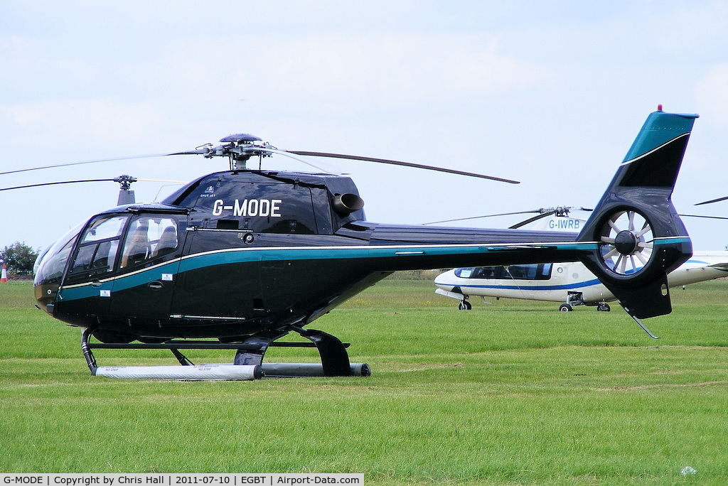 G-MODE, 2002 Eurocopter EC-120B Colibri C/N 1295, being used for ferrying race fans to the British F1 Grand Prix at Silverstone