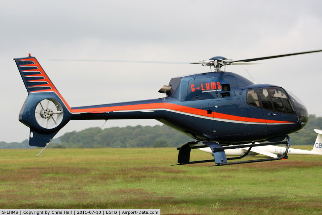 G-LHMS, 2006 Eurocopter EC-120B Colibri C/N 1442, being used for ferrying race fans to the British F1 Grand Prix at Silverstone