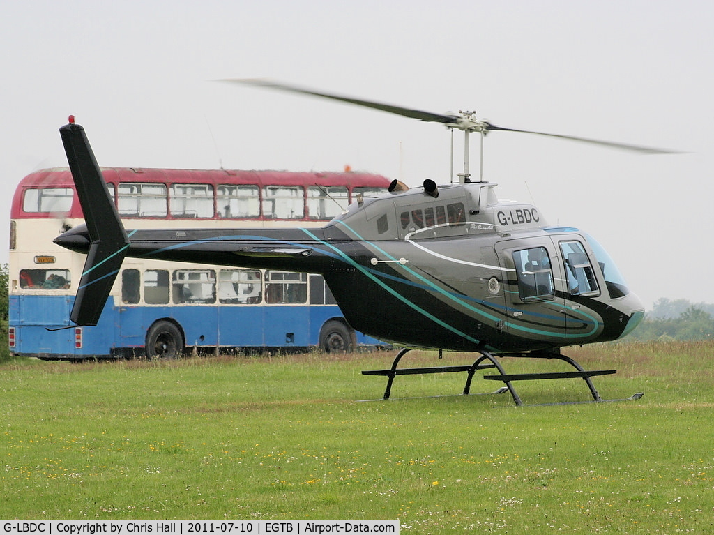 G-LBDC, 1984 Bell 206B JetRanger III C/N 3806, being used for ferrying race fans to the British F1 Grand Prix at Silverstone
