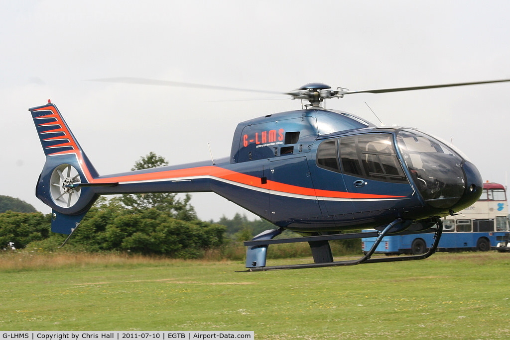 G-LHMS, 2006 Eurocopter EC-120B Colibri C/N 1442, being used for ferrying race fans to the British F1 Grand Prix at Silverstone