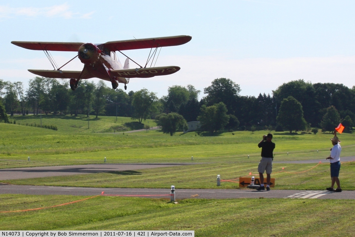 N14073, 1934 Waco YKC C/N 3990, Departing the EAA fly-in at Zanesville, Ohio