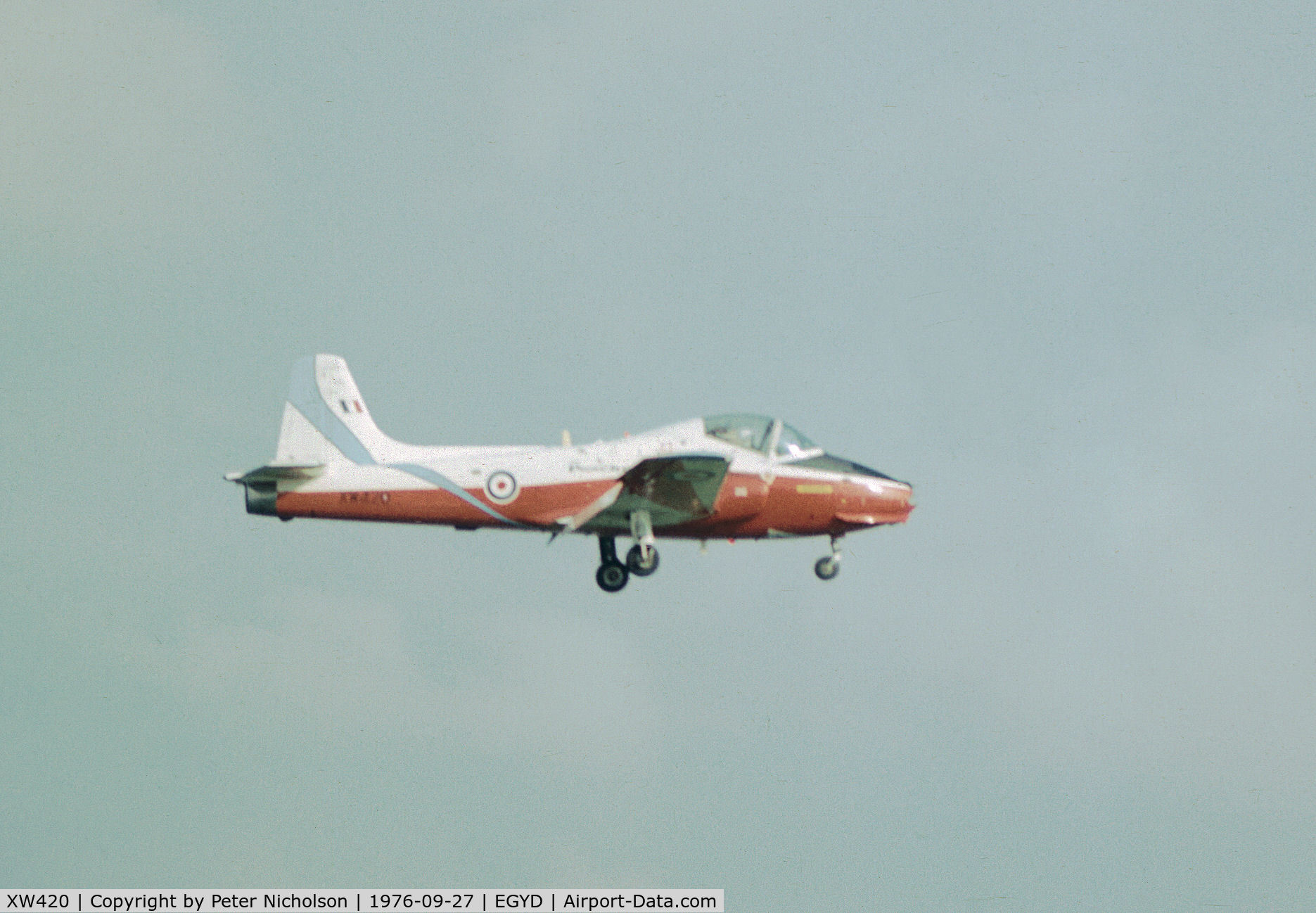 XW420, 1971 BAC 84 Jet Provost T.5A C/N EEP/JP/1042, Jet Provost T.5A of the RAF College's Poachers aerobatic display team returning to RAF Cranwell in September 1976.
