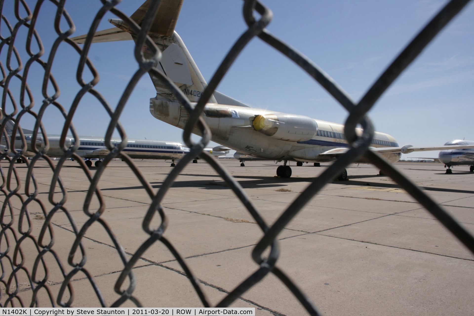 N1402K, 1991 Fokker 100 (F-28-0100) C/N 11353, Taken at Roswell International Air Centre Storage Facility, New Mexico in March 2011 whilst on an Aeroprint Aviation tour