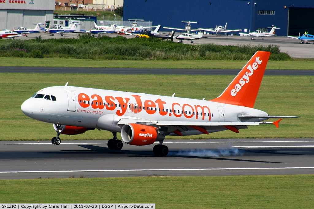 G-EZIO, 2005 Airbus A319-111 C/N 2512, easyJet A319 touching down on RW27, taken from the control tower
