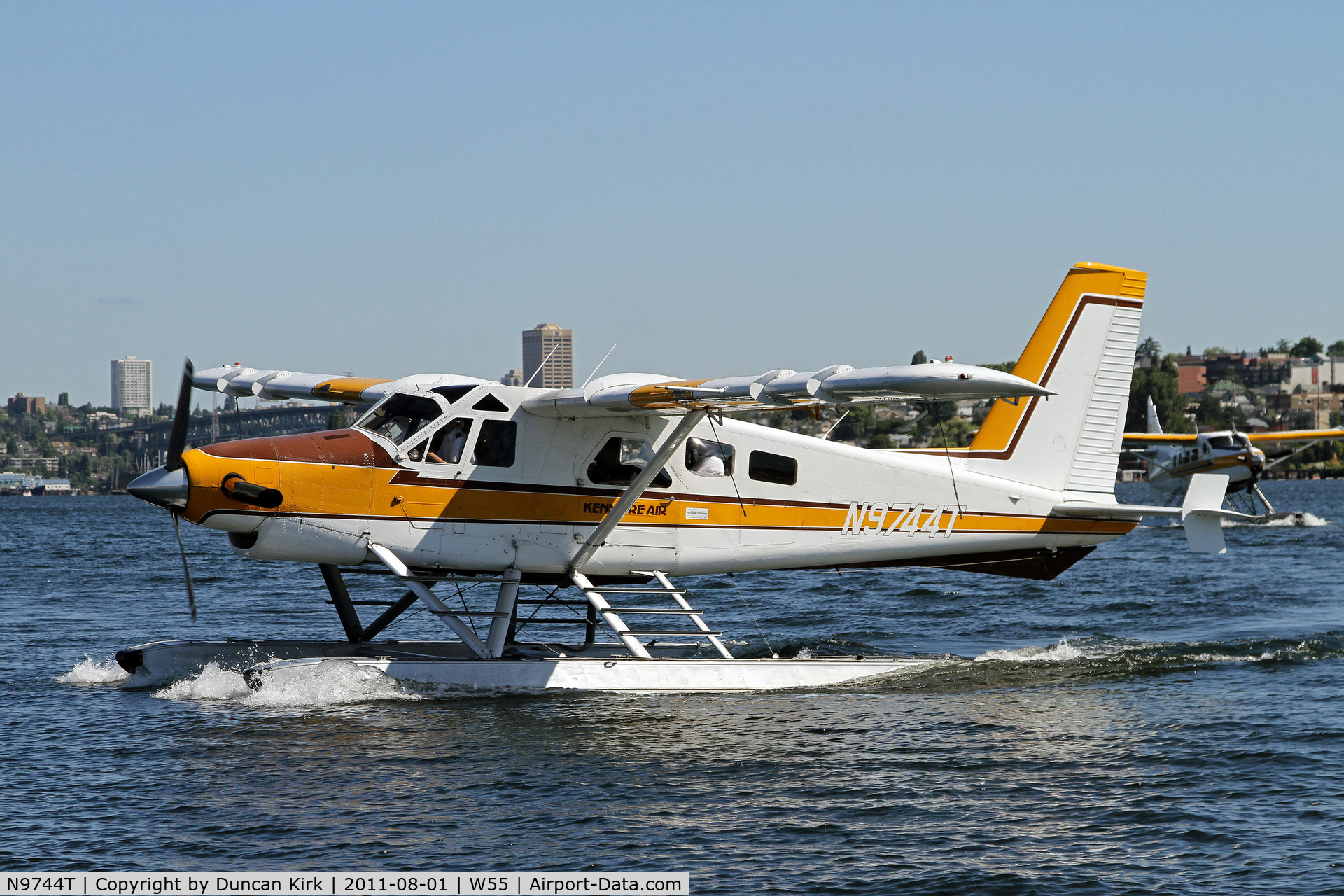 N9744T, 1968 De Havilland Canada DHC-2 Beaver Mk.3 C/N 1692, Kenmore Beaver taxiis in to Kenmore Lake Union's facility with a comany Turbo Otter right behind it