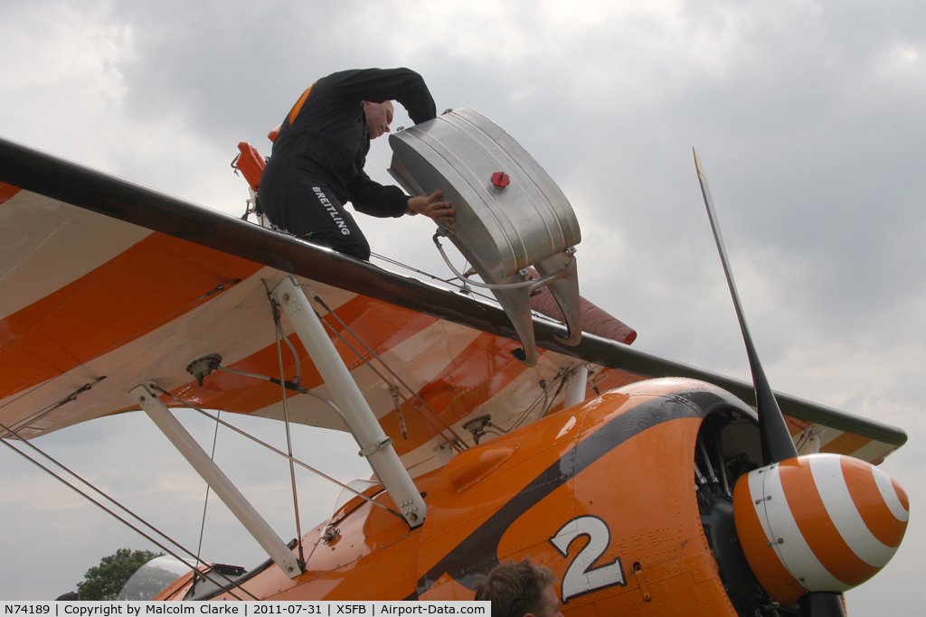 N74189, 1941 Boeing PT-17/R985 Kaydet (A75N1) C/N 75-717, Pilot David Barrell re-assembles the 