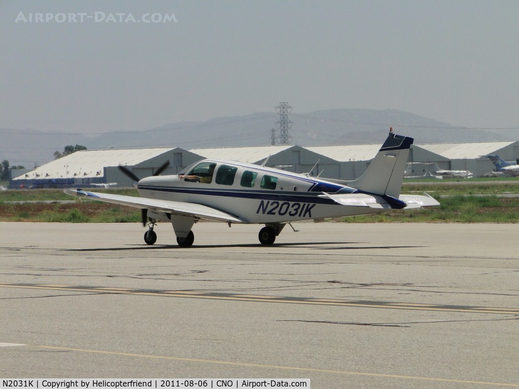N2031K, 1978 Beech A36 Bonanza 36 C/N E-1352, Just landed on runway 26R and is taxiing back to the hanger