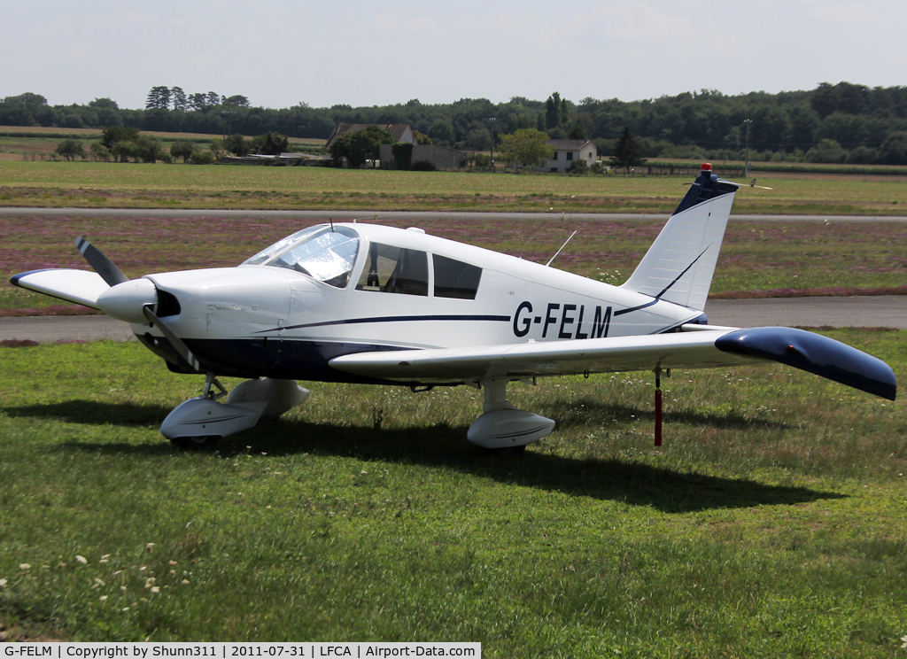 G-FELM, 1966 Piper PA-28-180 Cherokee C/N 28-3663, Parked on the grass...