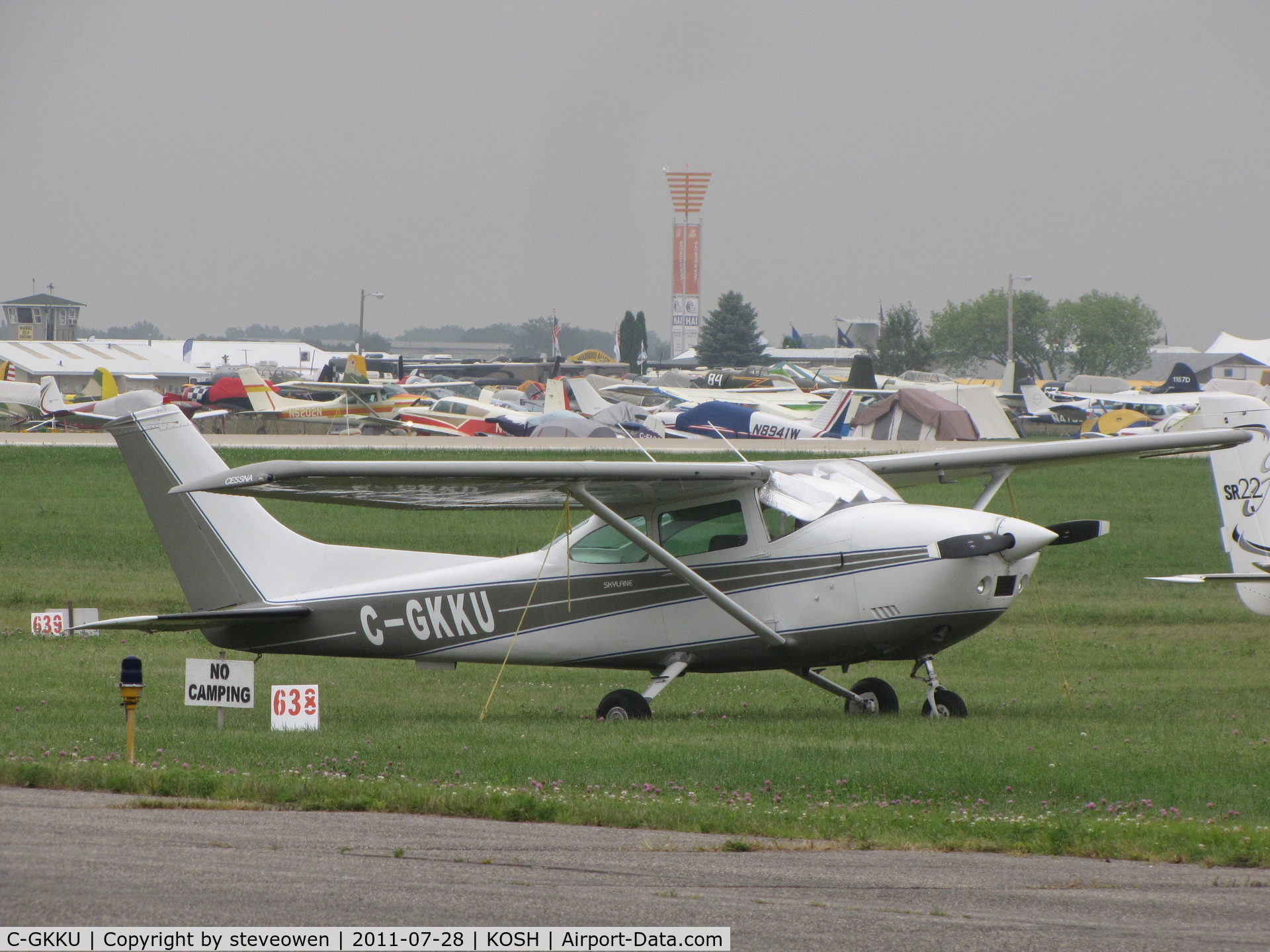 C-GKKU, 1974 Cessna 182P Skylane C/N 18263475, Tied down in GAP parking during EAA2011