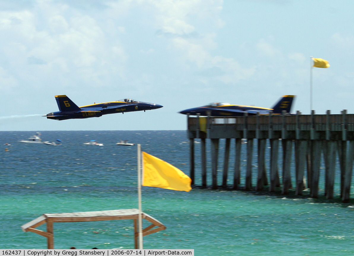 162437, McDonnell Douglas F/A-18A Hornet C/N 0281, Here's where the opposing solos meet at the Pensacola Beach Pier.  Great show if you can stand the heat and humidity.