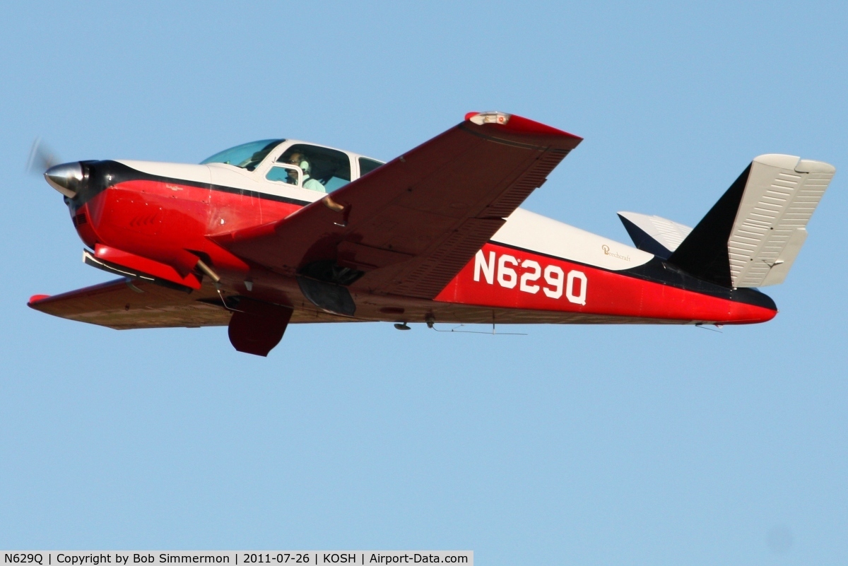 N629Q, 1959 Beech M35 Bonanza C/N D-6260, Departing Airventure 2011.