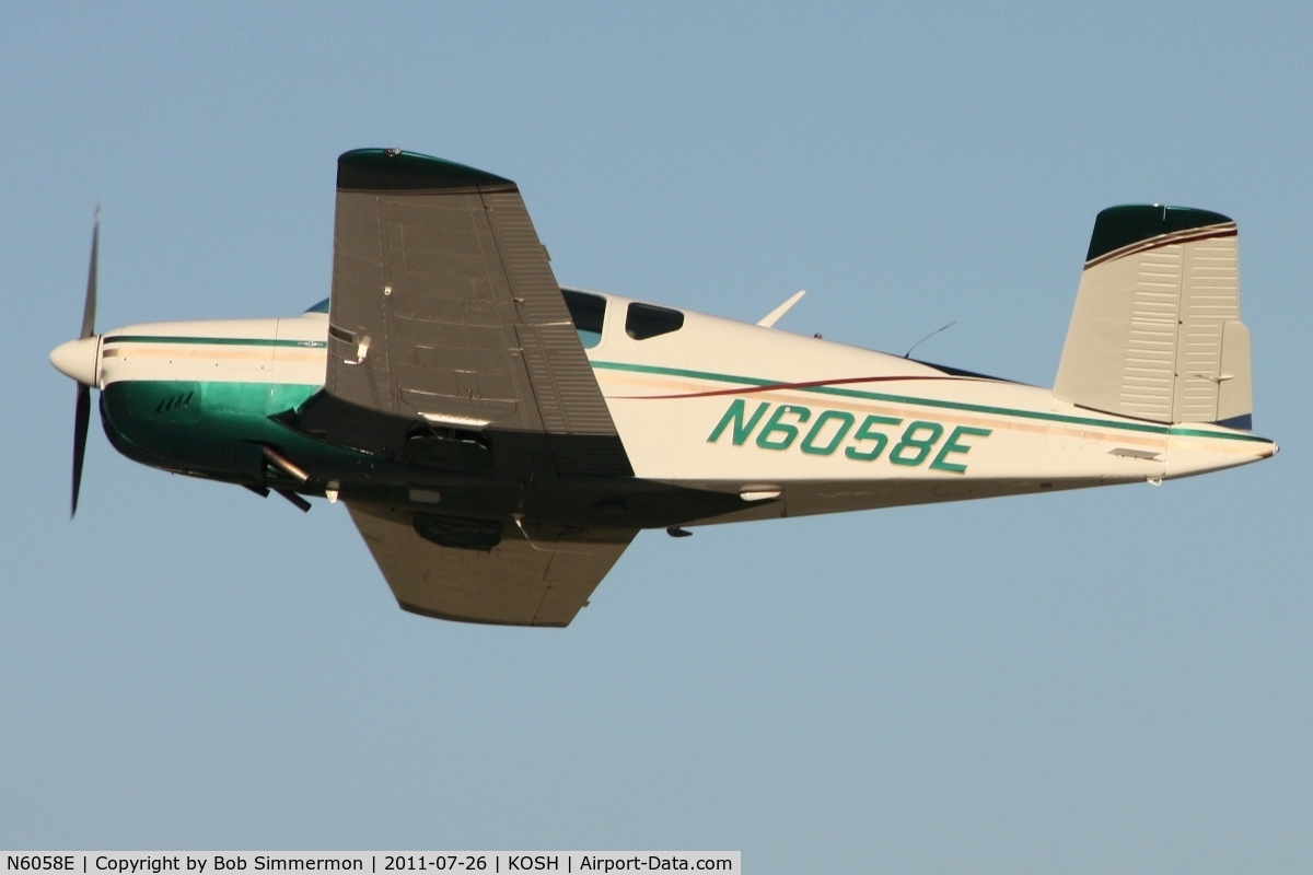 N6058E, 1959 Beech K35 Bonanza C/N D-6025, Departing Airventure 2011.