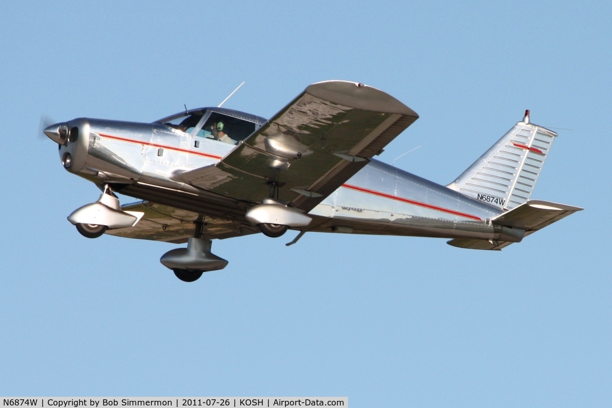 N6874W, 1965 Piper PA-28-140 Cherokee C/N 28-21030, Departing Airventure 2011.