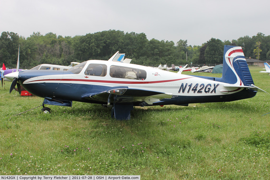 N142GX, 2004 Mooney M20R Ovation C/N 29-0342, Aircraft in the camping areas at 2011 Oshkosh