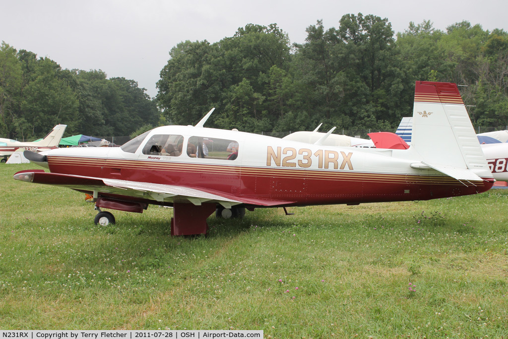 N231RX, 1980 Mooney M20K C/N 25-0305, Aircraft in the camping areas at 2011 Oshkosh