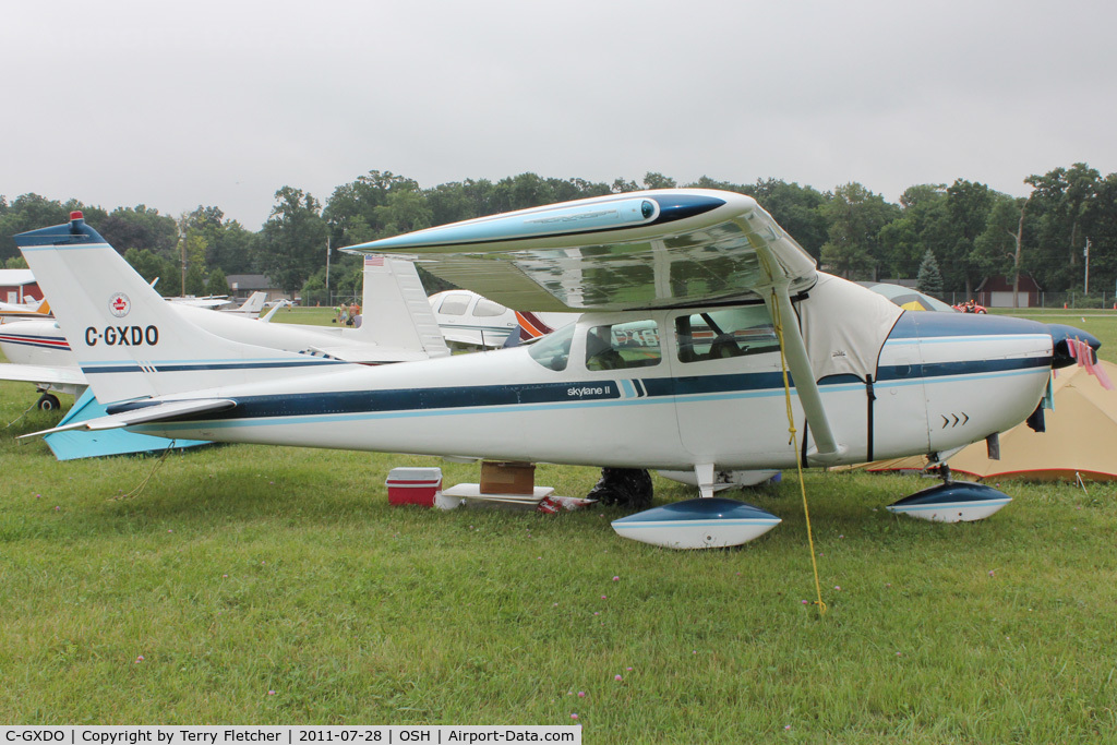 C-GXDO, 1962 Cessna 182E Skylane C/N 18253855, Aircraft in the camping areas at 2011 Oshkosh