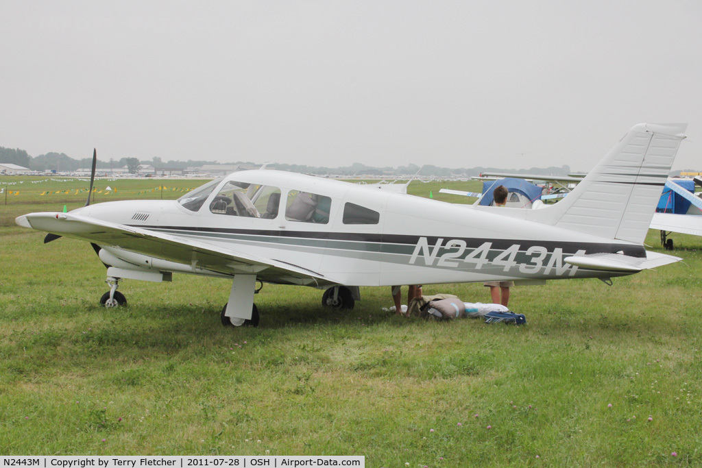 N2443M, 1977 Piper PA-28R-201T Cherokee Arrow III C/N 28R-7803128, Aircraft in the camping areas at 2011 Oshkosh
