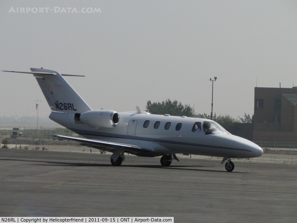 N26RL, 1997 Cessna 525 CitationJet CJ1 C/N 525-0207, Taxiing into a parking area south side of airport