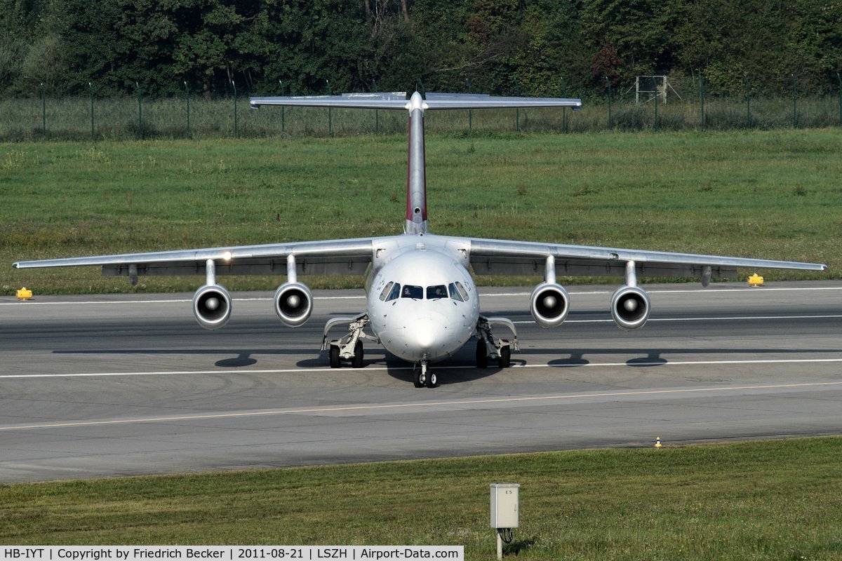 HB-IYT, 2000 British Aerospace Avro 146-RJ100 C/N E3380, vacating the runway