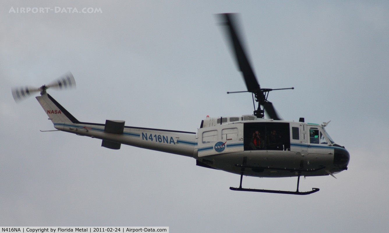 N416NA, Bell UH-1B C/N 622064, NASA UH-1B flying over Indian River near Titusville