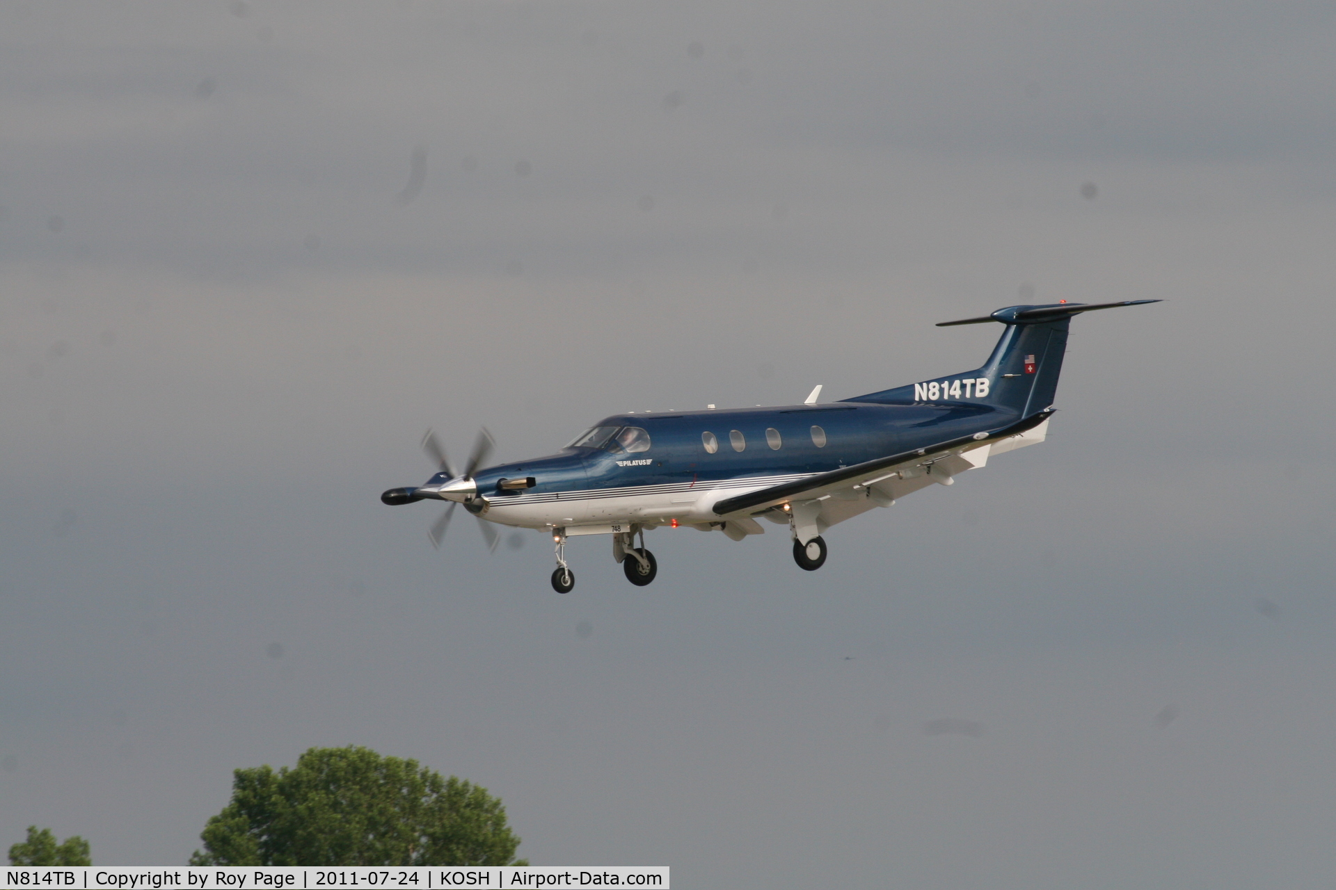 N814TB, 2006 Pilatus PC-12/47 C/N 748, N814TB arriving at Oshkosh at 5:30PM on 24th July 2011 using runway 36.