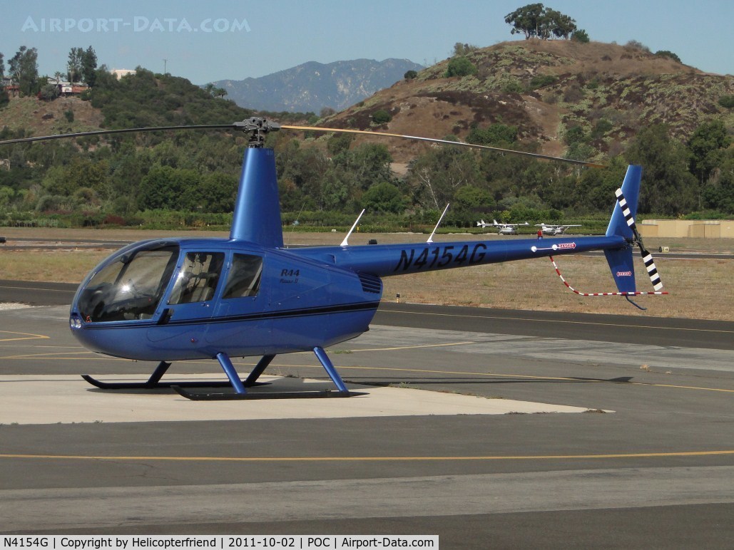 N4154G, 2008 Robinson R44 II C/N 12194, Parked west of Norm's Cafe