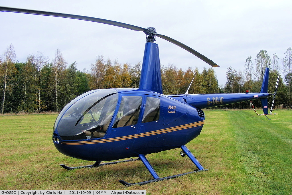 G-OGJC, 2009 Robinson R44 Raven II C/N 11653, At a fly-in at Manley Mere, Cheshire. Organised by Helicentre Liverpool in aid of the North West Air Ambulance