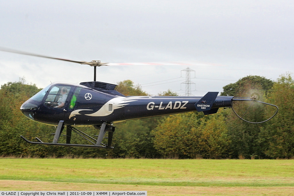 G-LADZ, 1993 Enstrom 480 C/N 5001, At a fly-in at Manley Mere, Cheshire. Organised by Helicentre Liverpool in aid of the North West Air Ambulance