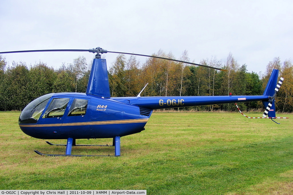 G-OGJC, 2009 Robinson R44 Raven II C/N 11653, At a fly-in at Manley Mere, Cheshire. Organised by Helicentre Liverpool in aid of the North West Air Ambulance