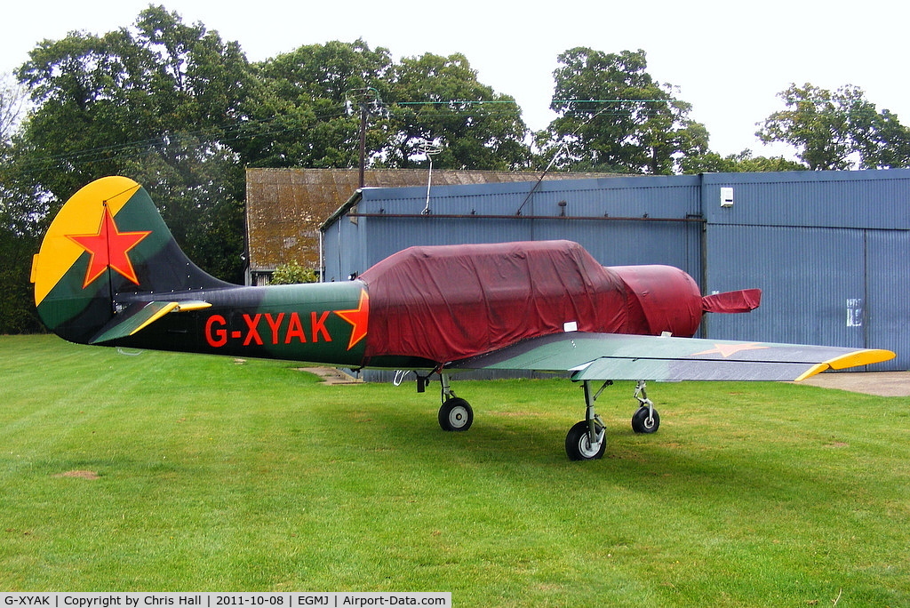 G-XYAK, 1989 Bacau Yak-52 C/N 899413, at Fullers Hill Farm, Little Gransden