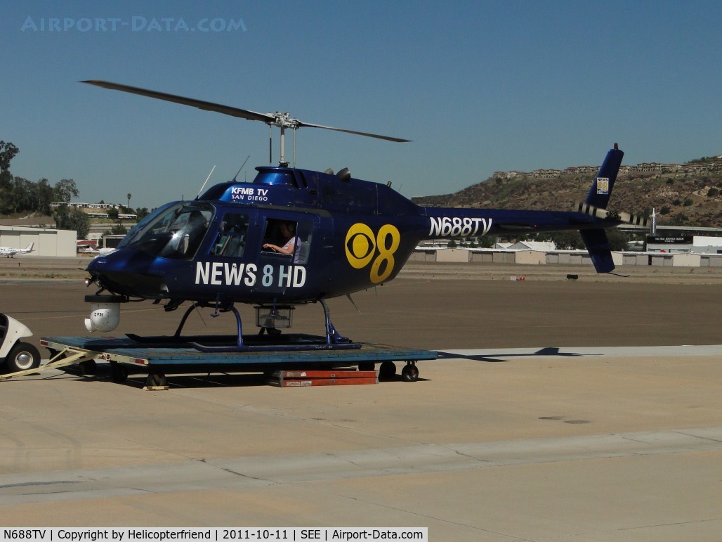 N688TV, Bell 206B JetRanger C/N 2642, Settling down on dolley after not locating a Mt Lion (Cougar) that had been reported at a school in Poway Ca