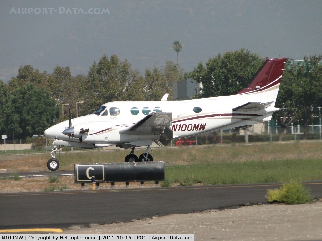 N100MW, 1972 Beech E90 King Air C/N LW-2, After visiting static display area, taking off on runway 26L