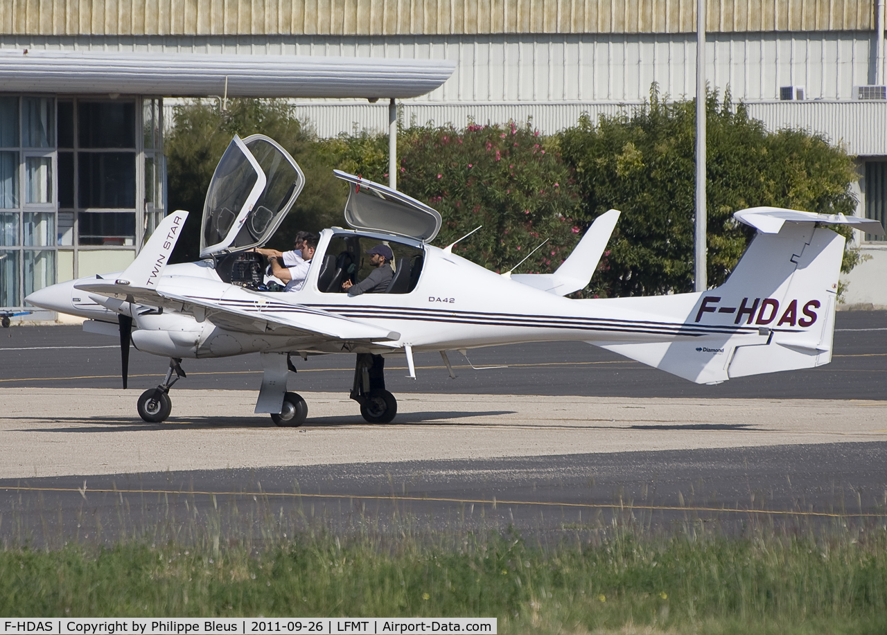 F-HDAS, Diamond DA-42 Twin Star C/N 42.268, Shortly after reaching parking stand. Picture shows how canopy and doors open.