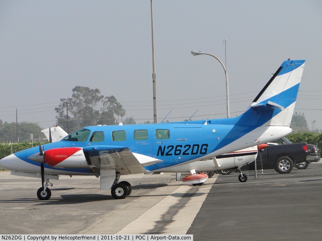 N262DG, 1982 Cessna T303 Crusader C/N T30300223, Parked in Howard Aviation parking area