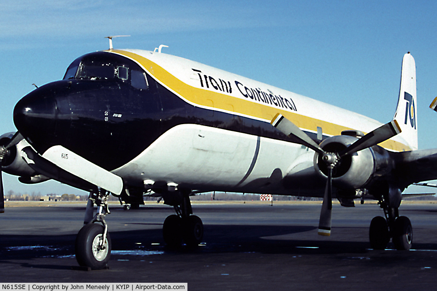 N615SE, Douglas DC-6A C/N 43296, Trans Continental DC-6 waiting for its next load of freight. Scanned from a slide. Taken in Nov. 1990 - exact date unknown.