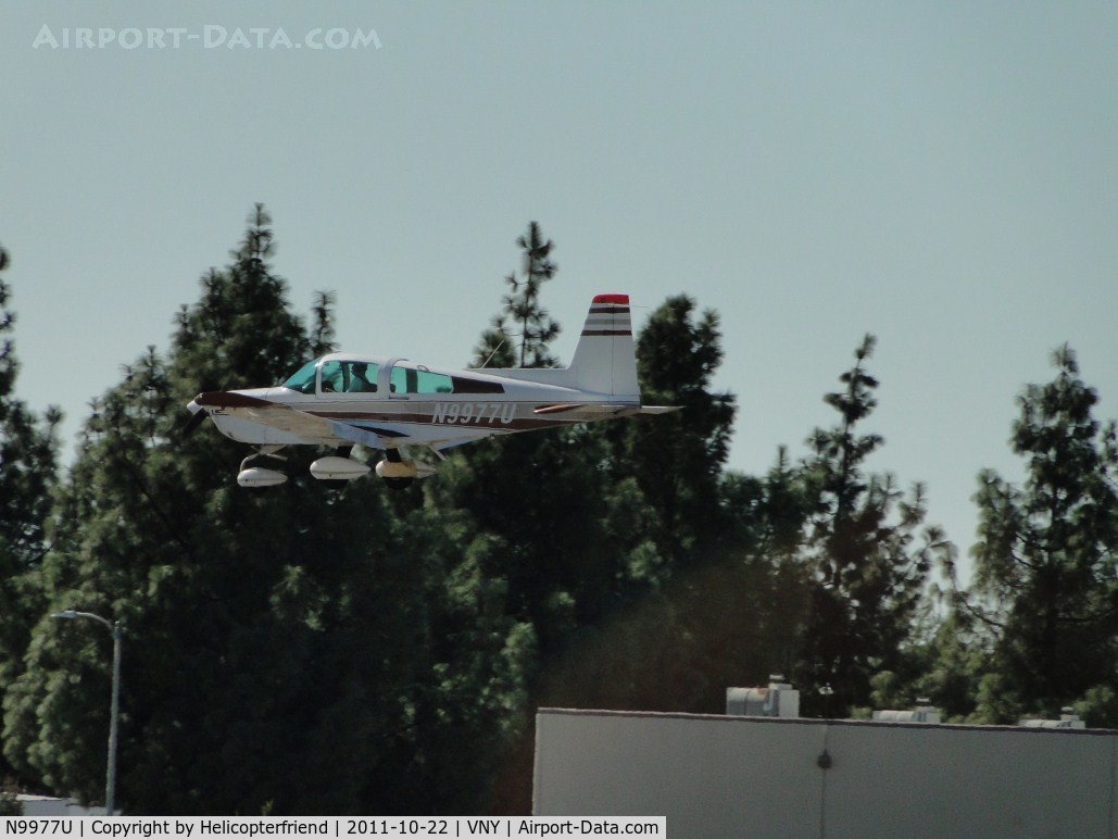N9977U, Grumman American AA-5A Cheetah C/N AA5A0377, Taking off from runway 16R