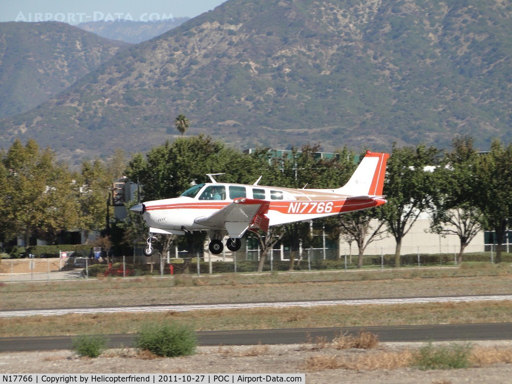 N17766, 1977 Beech A36 Bonanza 36 C/N E-1023, Almost down on runway 26L