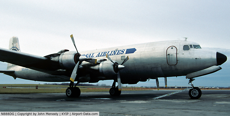 N888DG, 1956 Douglas VC-118A Liftmaster (DC-6A) C/N 44675, Parked at KYIP - Nov. 1990