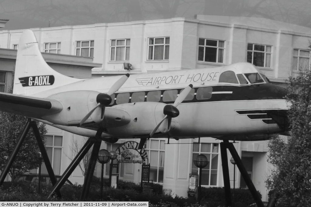 G-ANUO, 1954 De Havilland DH-114 Heron 2D C/N 14062, This airframe sits at the front of the  Terminal building at the old Croydon Airport that closed in 1959 - the airframe was recovered from Biggin Hill and restored in the colours and marks G-AOXL of Morton Air Services to represent the last scheduled flig